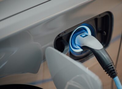 Close up of a an electric car being charged