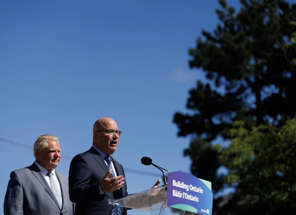 Ontario Premier Doug Ford, left, and Steve Clark, the minister of municipal affairs and housing have been under fire after critical reports by the auditor general and integrity commissioner found serious problems in the plan to develop parts of the Greenbelt.