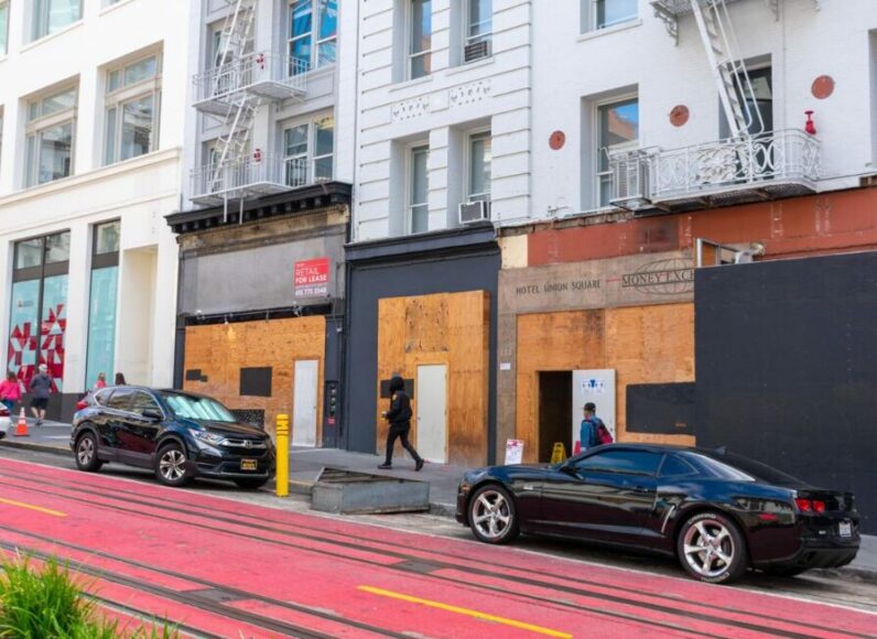 Abandoned storefronts are boarded up in San Francisco as some major cities in the U.S. struggle with empty office space due to post-pandemic changes in the way people work.