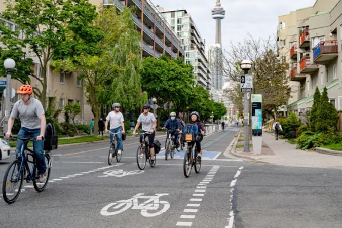 people biking in a bike lane